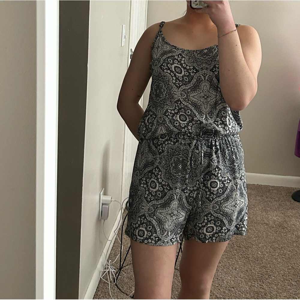 Romper with black and white design.
